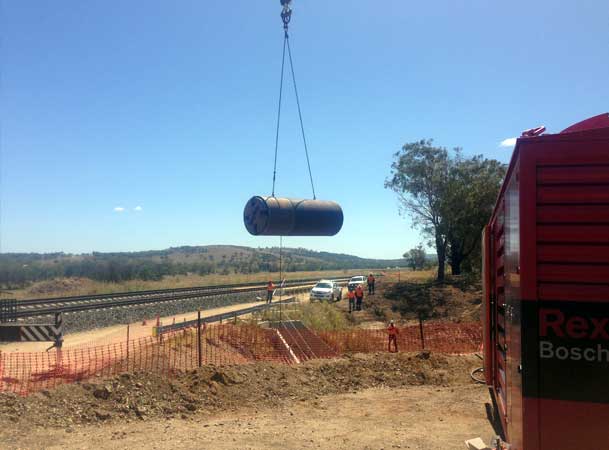 Microtunneling head being craned into position