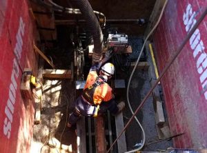 Downer ACT Pezzimenti Microtunneling Driller loads drill rods