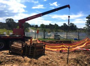 Rileys Creek Pezzimenti Crane Truck drops rods to shaft