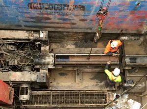 Cherrybrook Microtunnelling Pezzimenti Loading Auger onto jacking Frame